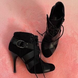 Guess Black Heeled Boots. 
Suede and Leather with Lace up, Zipper and Buckle.